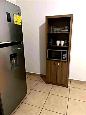 Área de microondas y vajilla, Apartamentos Trébol